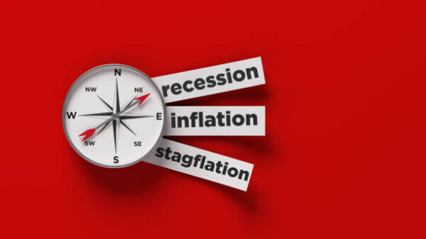 Compass recession inflation and stagflation text on red color background horizontal composition